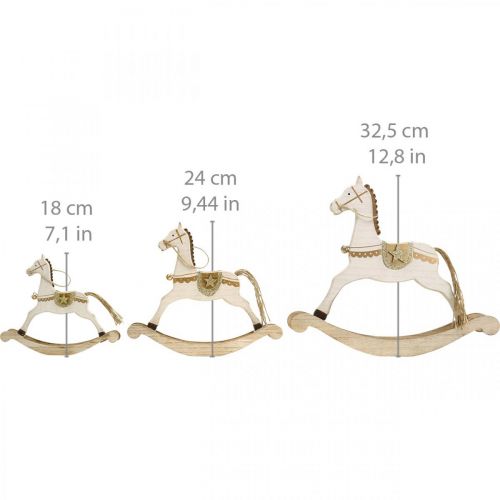 Artículo Caballito balancín de madera, adorno navideño Blanco Dorado Al. 32,5 cm