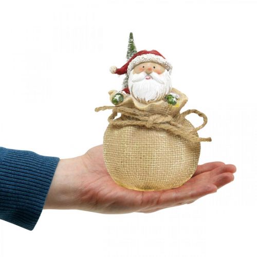 Artículo Figura decorativa Papá Noel en saco decoración navideña Ø8cm/H13cm 2 piezas