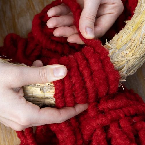 Artículo Cordón de lana Mirabell esponjoso con yute, rojo, 25 m