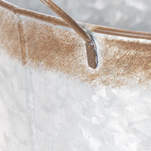 Artículo Maceta con asas, cuenco decorativo con acabado oxidado, recipiente de metal plateado Ø26cm H25.5cm