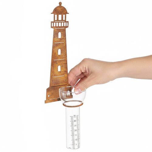 Pluviómetro con forma de faro y aspecto oxidado – Pluviómetro decorativo para jardín y valla de 41 cm con aspecto oxidado | Floristik24.es
