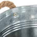Maceta decorativa de metal con