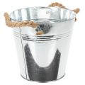 Maceta decorativa de metal con