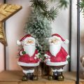 Floristik24 Figura decorativa Papá Noel con bastón de caramelo/regalo H8.5cm 4pcs
