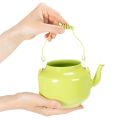 Tetera decorativa como florero, estilo retro nostálgico. | Floristik24.es