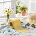 Cinta decorativa de moiré para coronas, color amarillo con borde dorado, 100 mm de ancho y 25 m de largo, ideal para floristería y decoración. | Floristik24.es