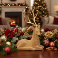 Figura decorativa de un ciervo recostado con astas, decoración flocada, 58 cm. | Floristik24.es