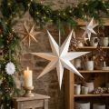 Decoraciones de estrellas de papel para crear un ambiente festivo, ideales para colgar. | Floristik24.es