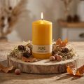 Vela de pilar sostenible elaborada con cera natural para una decoración ecológica. | Floristik24.es