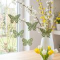 Percha decorativa mariposa purpurina verde 8cm 12uds | Floristik24.es