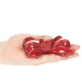 Portavelas rojos con forma de lazo para velas cónicas de 11 cm, 2 unidades. | Floristik24.es
