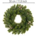 Corona de ramas de abeto artificiales con piñas para puerta o mesa, 30 cm. | Floristik24.es